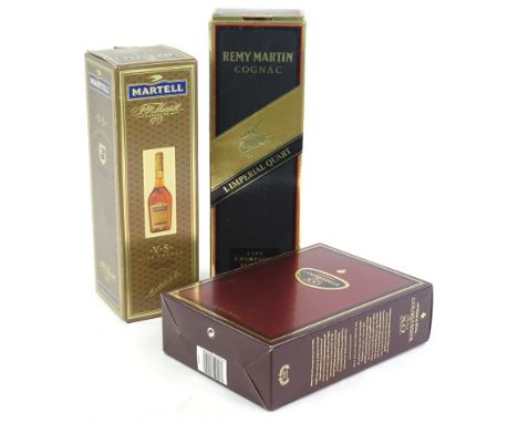 Three bottles of Cognac, to include Martell, Remy Martin and Courvoisier xo Imperial.