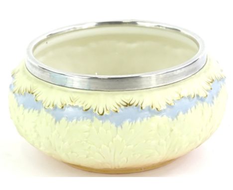 A Lock and Co Worcester salad bowl, moulded in relief with leaves etc., and with a silver plated mount, printed mark in red t