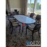 7 piece set of outdoor furniture including (6) metal chairs with cushions, and (1) 7 foot x 42 in.