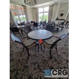 5 piece set of outdoor furniture including (4) metal chairs with cushions, and (1) table 43 in.