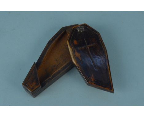 A large early 19th Century hand carved Folk Art snuff box of coffin form with sliding lid and inset crown, measures approx. 5
