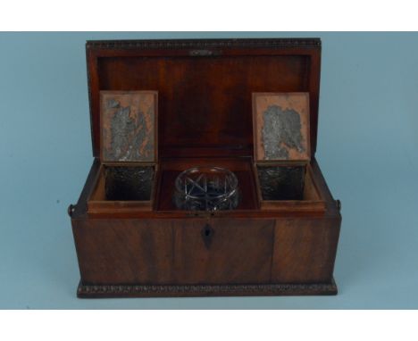 A mid 19th Century mahogany tea caddy with fitted interior and mixing bowl and turned ring handles to exterior