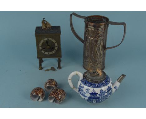 A mixed interesting lot to include a brass clock with ticking ship (not working), an Art Nouveau copper two handled vase, a V