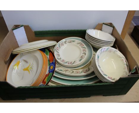 A selection of Susie Cooper dinner wares including two leaping deer meat plates (the largest as found), other meat plates, di