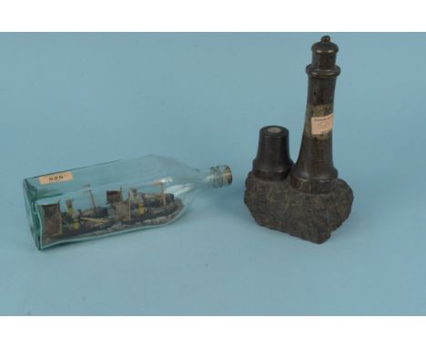 A Cornish serpentine stone model lighthouse with additional compass plus vintage ships in a bottle with four Gt Yarmouth mode