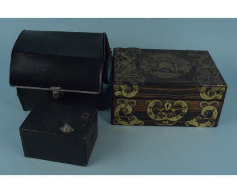 A vintage cased Polaroid camera plus a Box Brownie camera and a wood casket with brass overlay