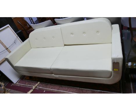 A contemporary cream leather sofa, button back cushions, on splayed legs, H.77 W.177 D.78cm 