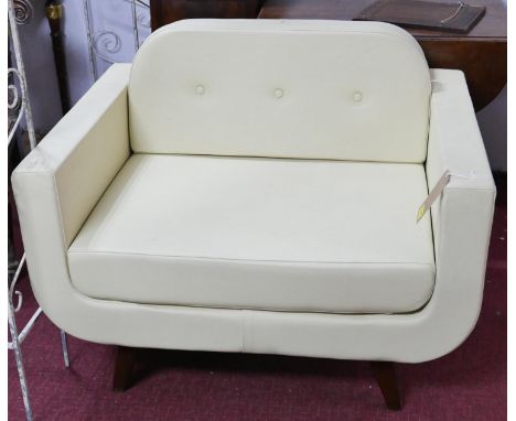 A contemporary cream leather armchair, button back cushion, on splayed legs, H.76 W.99 D.78cm 