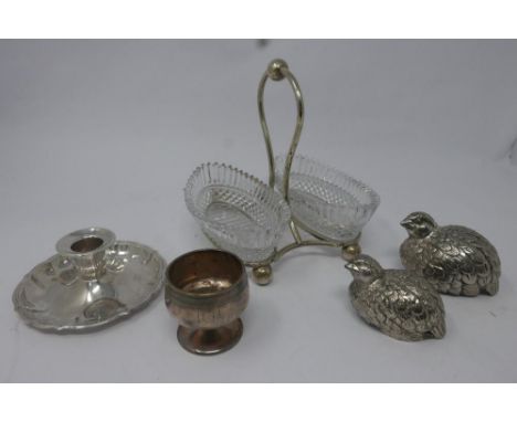 A collection of silver plated ware, comprising candlestick, glass dishes on stand, two bird salt and peppers, and a white met