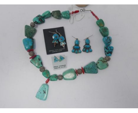 A collection of sterling silver and turquoise jewellery to include a large beaded necklace interspaced with red coral beads 2