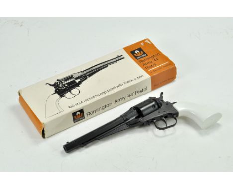 Winfield Woolworths Toy Remington Army Cap Pistol with original box. Good working mechanism.