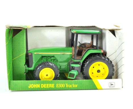Ertl 1/16 John Deere 8300 Tractor. Excellent in box.
