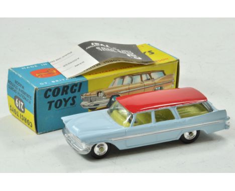 Corgi No. 219 / 445 Plymouth Sports Suburban Station Wagon. Light blue body with red roof and spun hubs. Yellow interior. App
