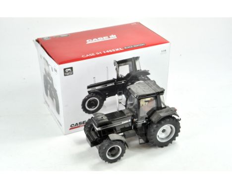 Universal Hobbies 1/16 Case IH 1455XL Black Edition Tractor. In need of some restoration and a clean.