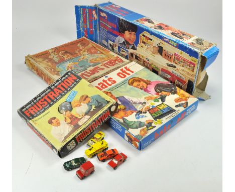 Trio of vintage games plus Hot Wheels Service Center, which appears predominantly complete. Plus some worn diecast vehicles.