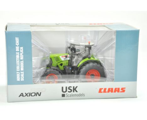 USK Scale Models 1/32 Farm issue comprising Claas Axion 850 Tractor. Excellent, secured in box, not displayed.