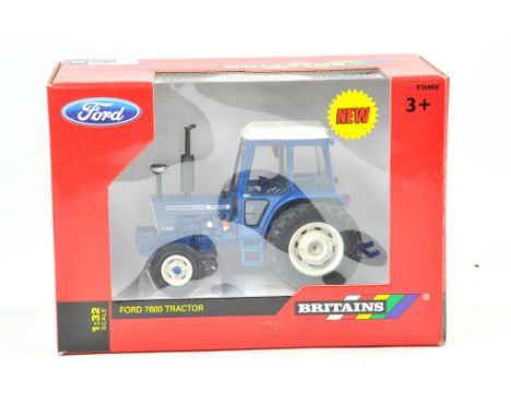 Britains 1/32 Farm issue comprising Ford 7600 Tractor. Note Wheel Conversion. Previously on display, the model appears very g