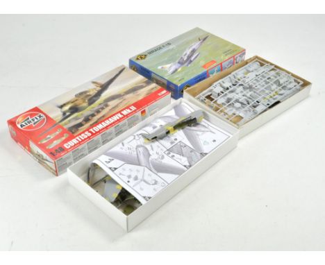 Airfix 1/48 model kit comprising Curtis Tomakawk plus FM Mirage. Both appear complete, albeit some modeller tape preprep.