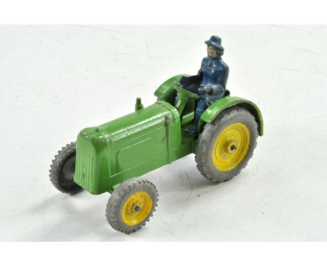 Charbens vintage farm tractor in rare green with yellow wheel centres. Plus driver. Some light damage, otherwise an excellent