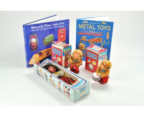 Misc. group of Toys comprising Pelham Puppet, duo if Japanese Mechanical Monkey issues plus reference books. Generally good t