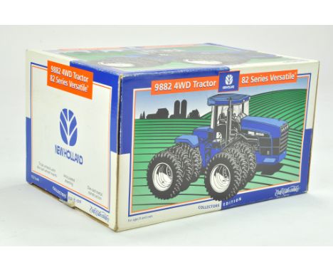 Ertl 1/32 Collectors Edition New Holland 9882 Versatile Tractor. Appears to not have been removed, hence excellent in box.