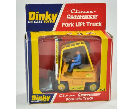 Dinky No. 404 Climax Fork Lift. Yellow body with 'Conveyancer' on fork guide, and 'TC4' on engine cover. Appears excellent wi