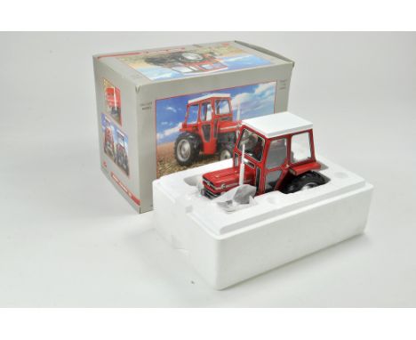 Universal Hobbies 1/16 Farm issue comprising Massey Ferguson 135 Tractor with Cab. Model appears excellent and secured in ori