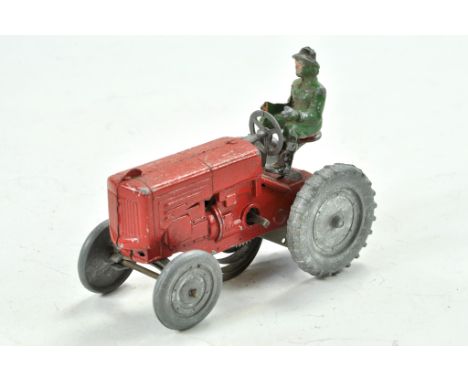 Pure Rubber - Benbros Mechanical Tractor with Driver in Red. Scarce item is generally very good, minor marks and wear, appear