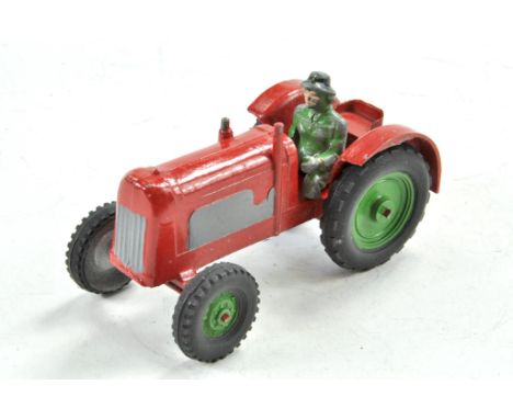 Charbens vintage farm tractor in red with grey / silver and trim, green wheel centres. Driver is legless, otherwise very good