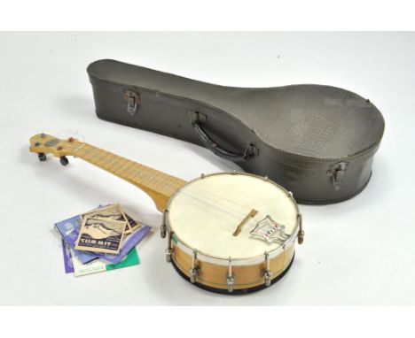 John Grey and Sons Vintage issue Ukelele with Case and spare string sets. Appears in very good to excellent condition.