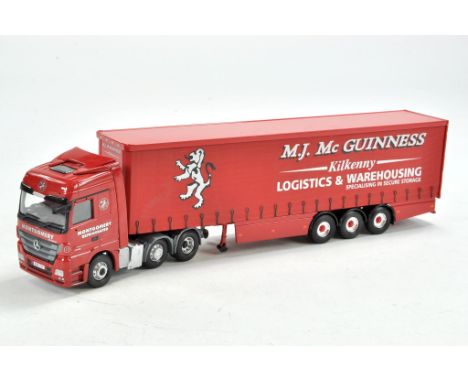 Corgi Diecast Model Truck issue comprising Mercedes Curtainside Trailer in livery of McGuinness. Some damage. Lacking mirrors