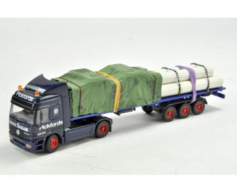 Code 3 Model Truck issue in 1/50 comprising Mercedes Actros Flatbed with load in the livery of Pickfords. Excellent.