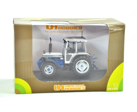 Universal Hobbies 1/32 Farm issue comprising Ford 7810 Silver Jubilee Tractor. Excellent, secured in box, not displayed.