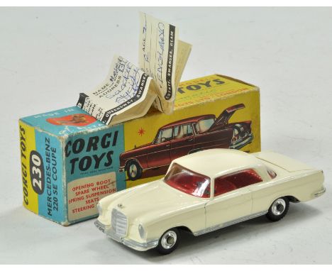 Corgi No. 230 Mercedes-Benz 220 SE Coup?. Cream body with red interior. Shaped spun wheels with spare wheel and suitcase in b