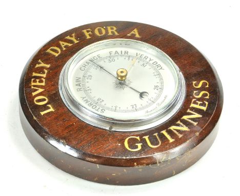 A vintage Guinness OAK Wooden Wall Barometer. Looks to be very good. Rare.