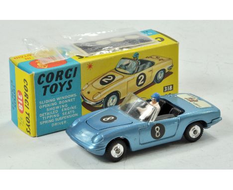 Corgi No. 318 Lotus Elan S2 Open Top. Metallic steel blue body, RN '8' with driver. 'I've got a tiger in my tank' decal on bo