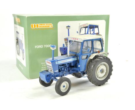 Universal Hobbies 1/16 Ford 7000 Tractor. In need of a clean and minor restoration.