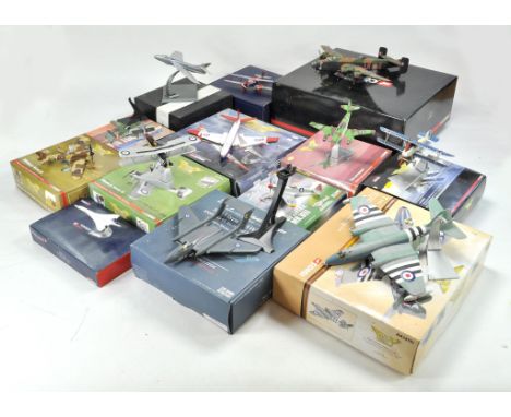 A collection of thirteen diecast model aircraft comprising mostly Corgi plus Oxford, Sky Guardians etc. Models have been disp