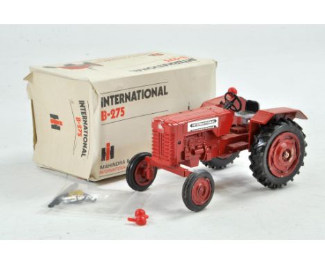 Maxwell India 1/24 approx Mahindra International B-275 Tractor. Generally very good in fair to good box. Scarce.