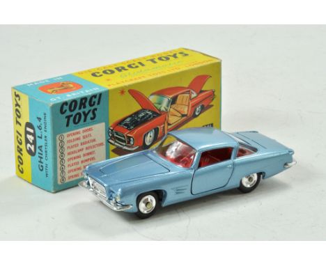 Corgi Toy No. 241 Chrysler Ghia L.6.4. Metallic silver - blue body with red interior. Shaped spun hubs and a Corgi dog figuri