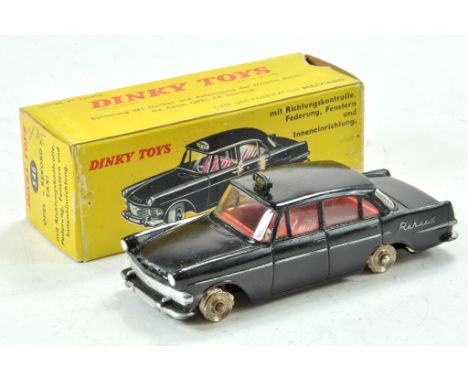 French Dinky Toy No. 546 Opel Rekord "Taxi". Black body and roof sign, red interior, silver trim, chrome concave hubs, tyres 