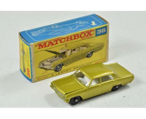 Matchbox Regular wheels No. 36C Opel Diplomat. Gold with white interior, chrome engine, and unpainted base. Appears excellent