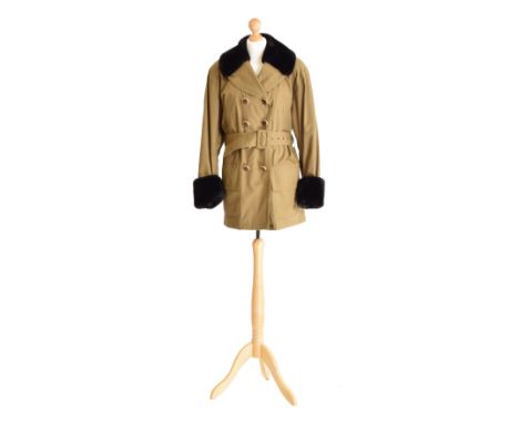 A double-breasted coat by Yves Saint Laurent, the three quarter length khaki coat with double breasted fastening, wood and go