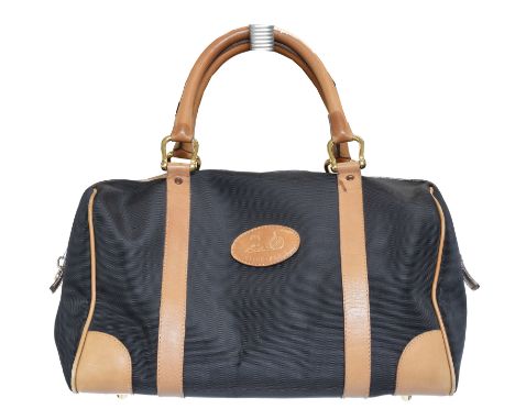 A Celine Boston Tote Bag, the black nylon canvas exterior with smooth tan leather accents and gold tone hardware, serial no. 