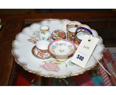 A collection of miniature pieces of china, including: a Royal Crown Derby miniature teacup and saucer in Imari colours; a bas