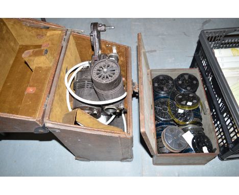 A Bell & Howel cine projector; together with 8mm films.