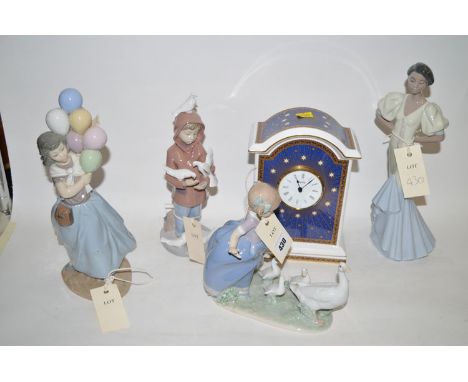 Four Lladro figurines, boxed; together with a Spode limited edition Millennium celebration clock, boxed.