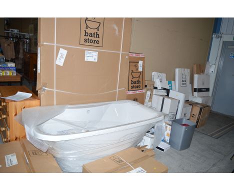 A large quantity of new/unused bathroom fixtures and fittings, including: bath, shower screen, toilet pans, limestone basin, 