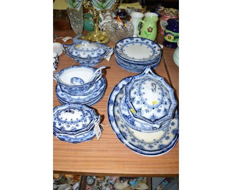 A Victorian blue and white dinner service, comprising: two large serving plates, two sets of large and small tureens with cov