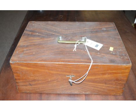 A 19th Century metal strong box, painted to look like mahogany, opening to reveal an instruction leaflet explaining how to se